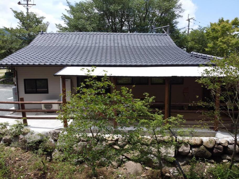 【コテージくぎの】大谷川沿いの露天風呂があるコテージ Minamiaso Exterior foto